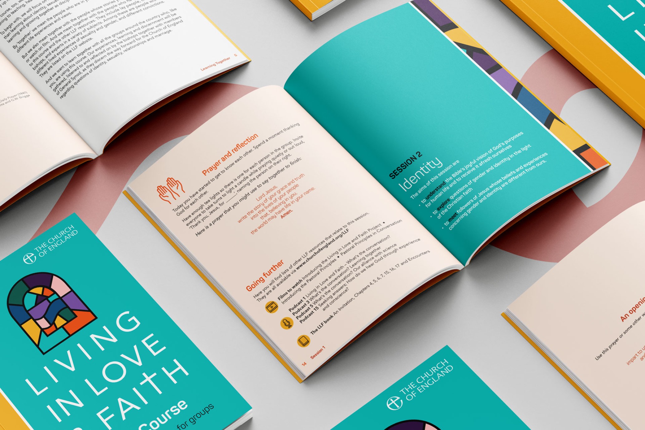 Open brochure with colour spreads and text.