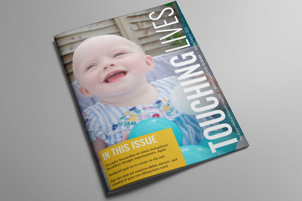 Front cover of a magazine called 'Touching Lives' with a picture of a happy baby on the cover.